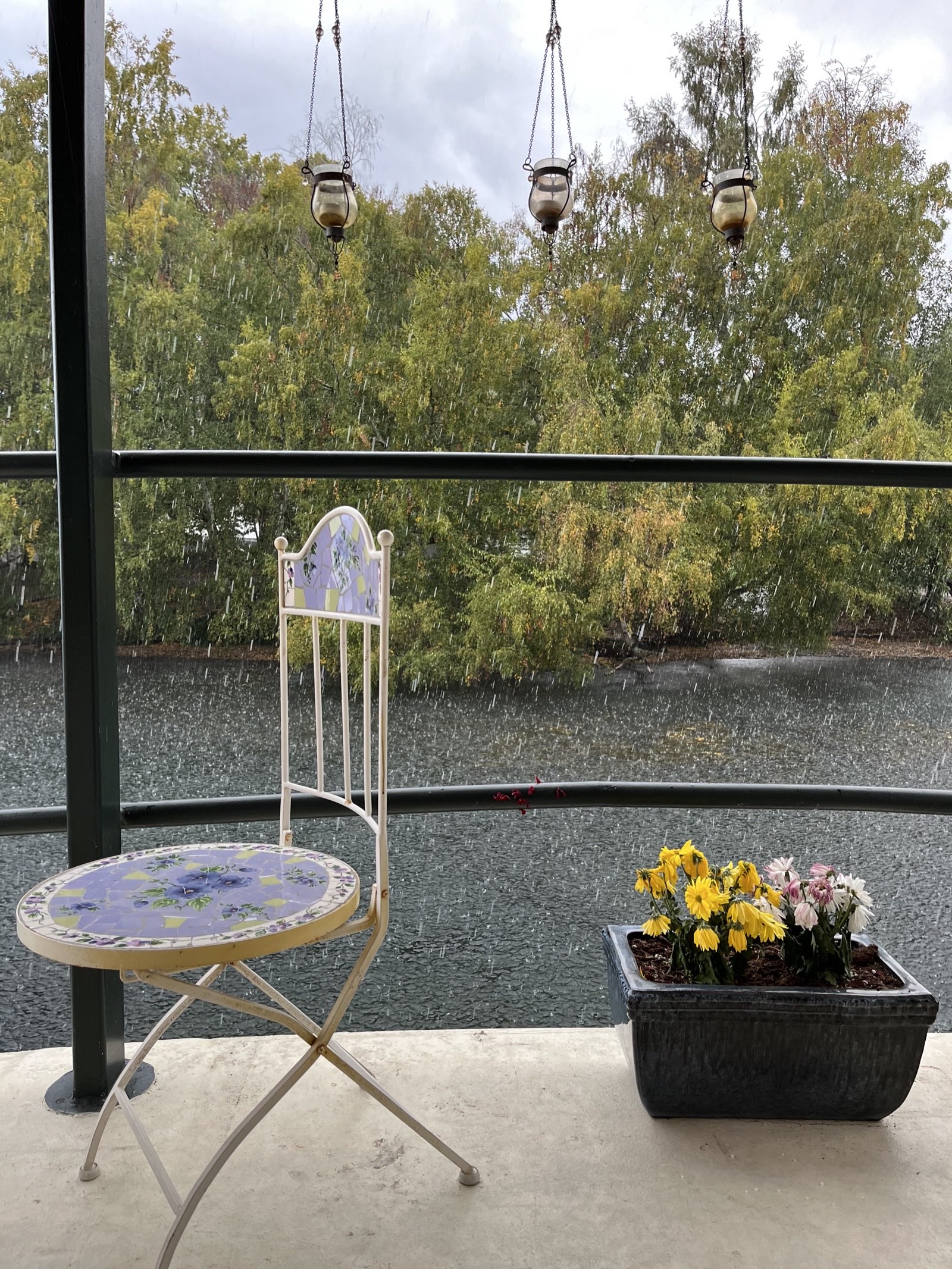 Houseboat deck on a rainy day